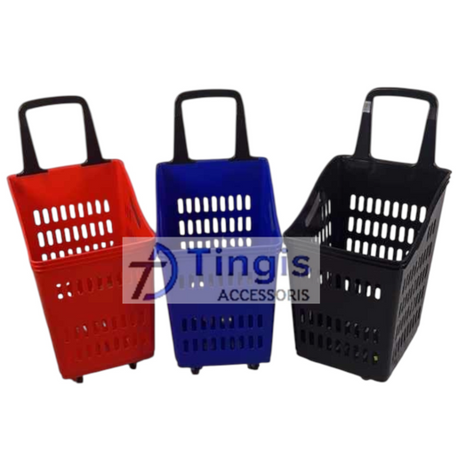 Three colorful shopping baskets, one in each red, blue, and black, stand lined up with their handles ready to roll for easy use.